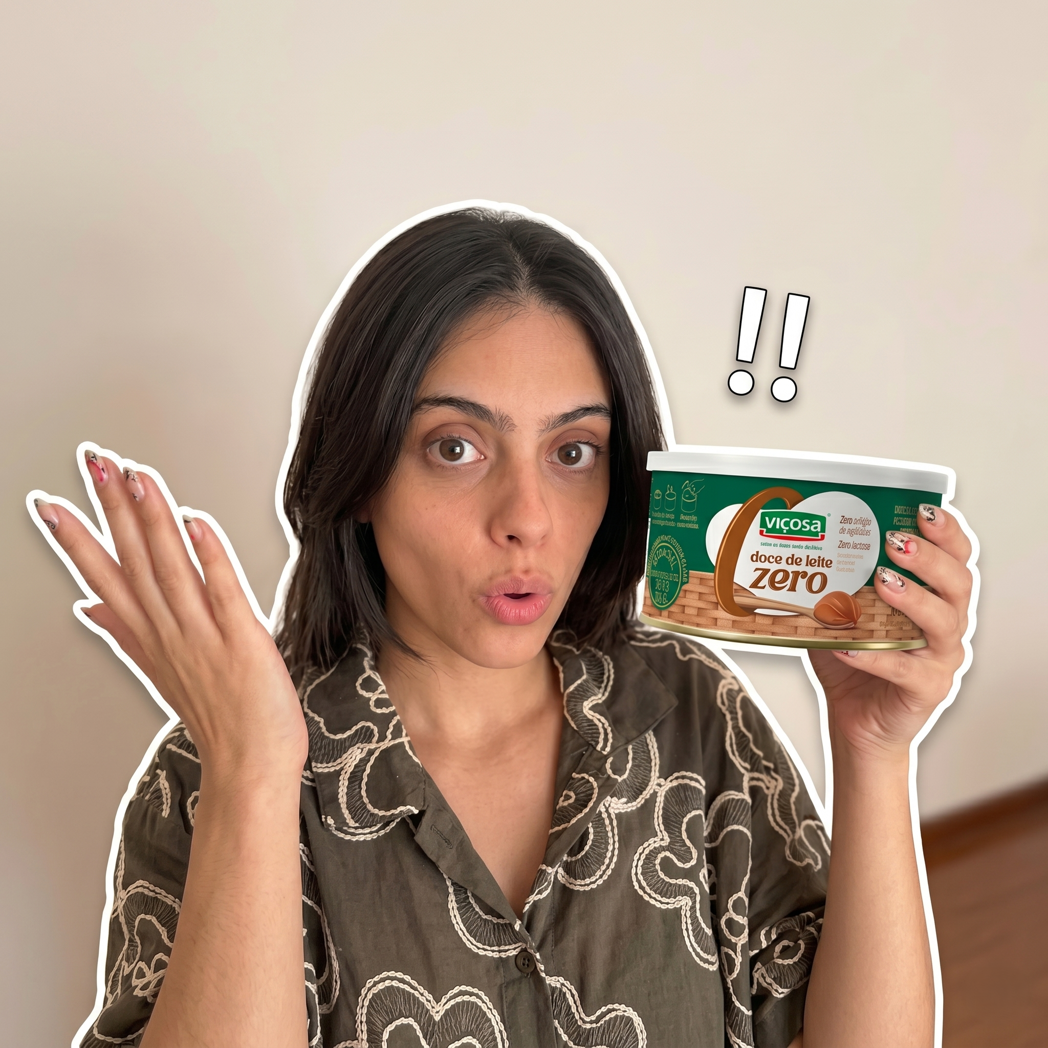 Influenciadora reagindo com surpresa ao Doce de Leite Zero Viçosa